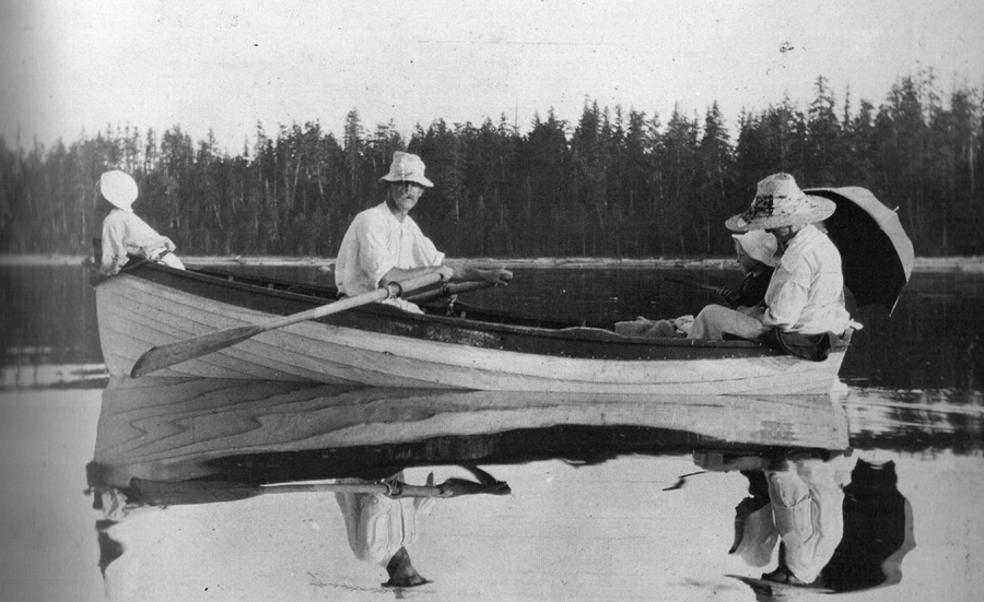 "That's my dad [Ashton Spilsbury] rowing the Herchmers' boat, c. 1914. I am in the bow keeping watch; Mrs. Herchmer and Laurencia are in the stern."
(Source: Spilsbury's Album by Jim Spilsbury, Harbour Publishing, 1990, www.harbourpublishing.com)
