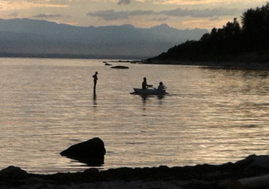 Young girl walks on water at Duck Bay.  It's a magical place.